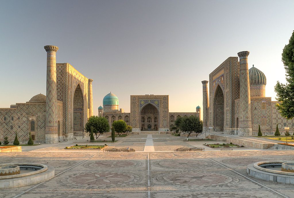 traditional and ornate architecture in Uzbekistan: domes, pillars and archways covered with intricate details