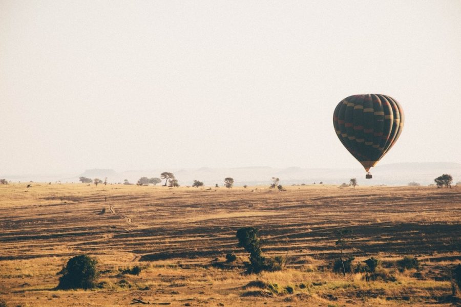 A hot air ballon hovering over the Serengeti National Park