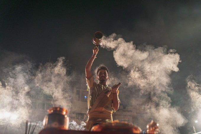 A man performing a ceremony in Varanasi, India