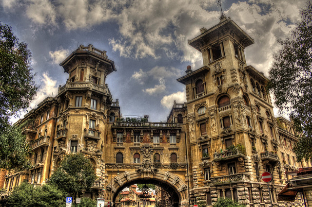 a Gothic like archway and buildings