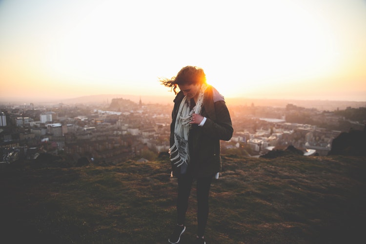 Woman on a hilltop in Edinburgh, United Kingdom