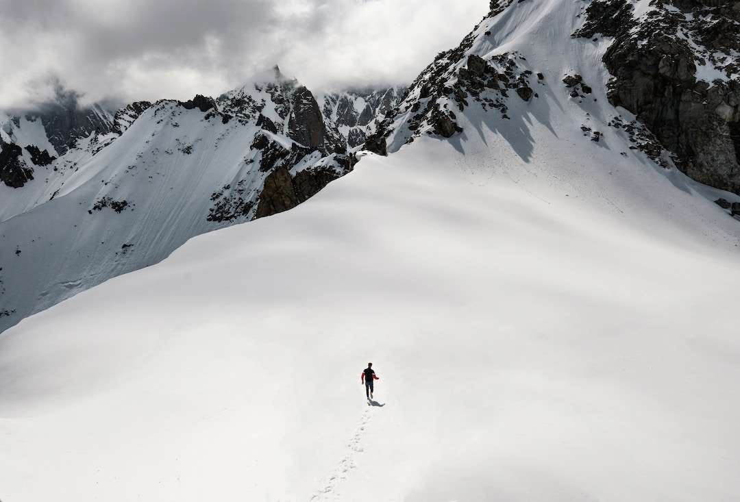 A man walking alone along Mont Blanc