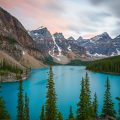 A bright blue lake surrounded by mountains