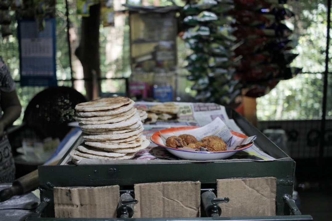 a plates of flat breads on a carton