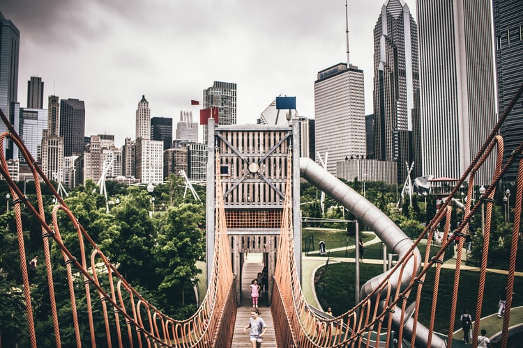 two people jogging on bridge