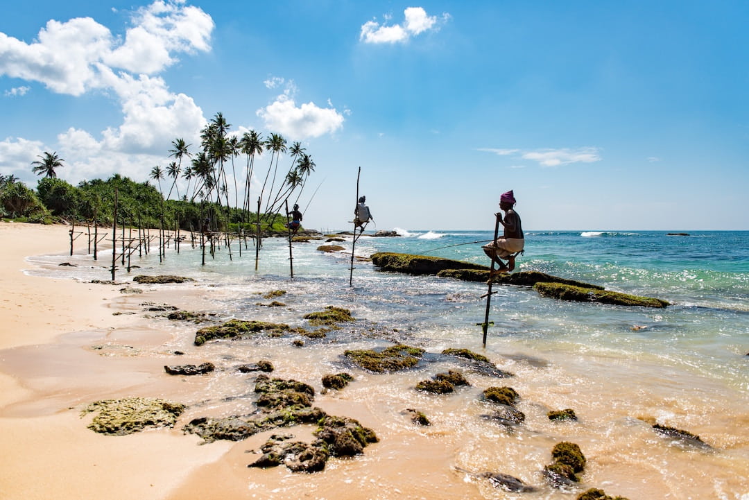 Local stilt fisherman at Mirissa Beach, Sri Lanka