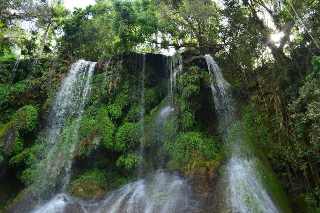 El Nicho waterfalls cascading down a hill in Topes de Collantes Nature Reserve Park