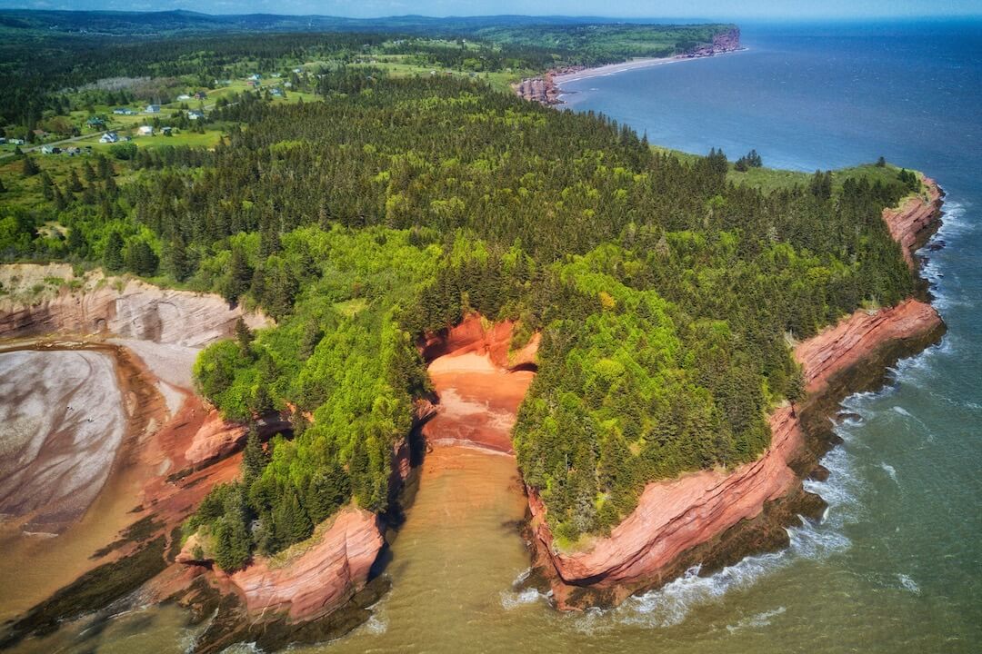 Caves and coastal features at low tide on the Bay of Fundy, near