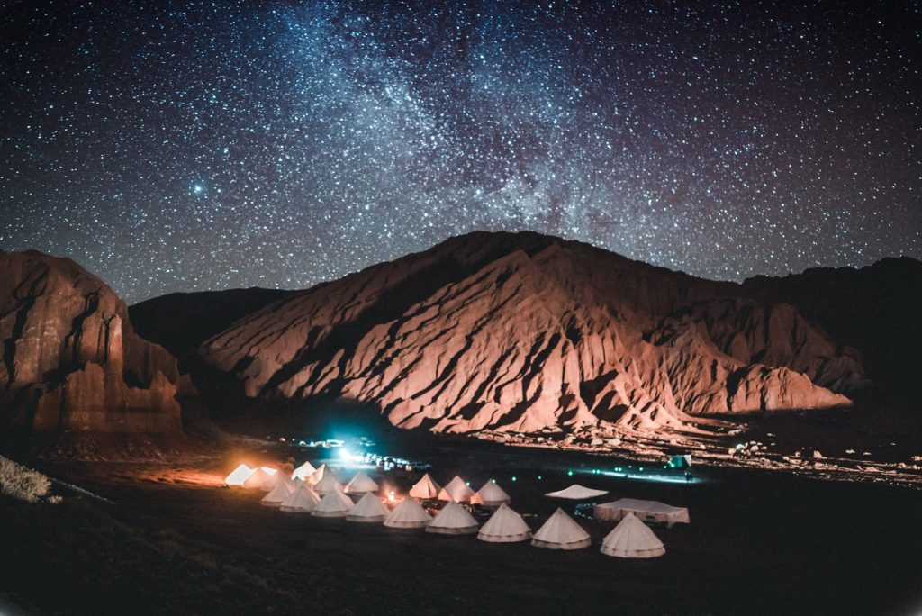 tents near mountain during nightime