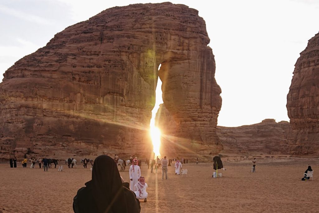 People taking pictures at the famous Elephant Rock in AlUla, Saudi Arabia