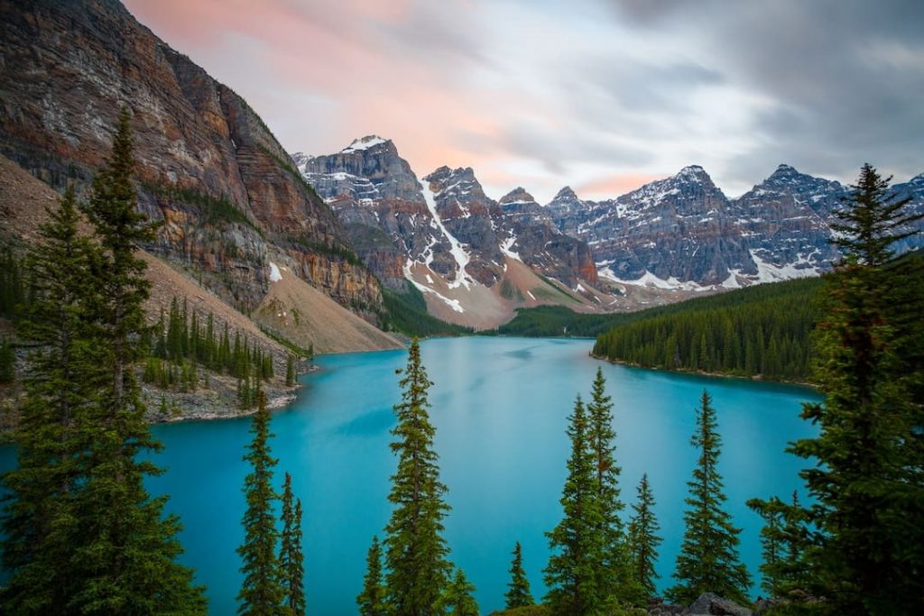 A bright blue lake surrounded by mountains